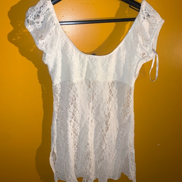 Never before worn tags on BEBE BABY DOLL TOP !! - Picture 3 of 3